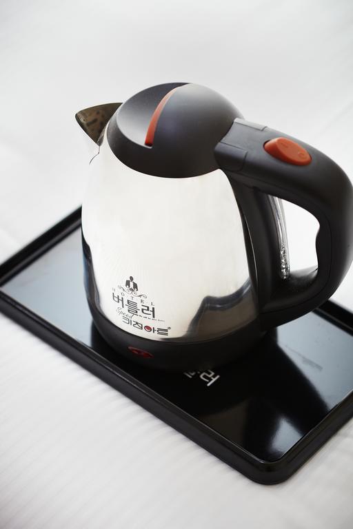 סוואן Hotel Butler חדר תמונה